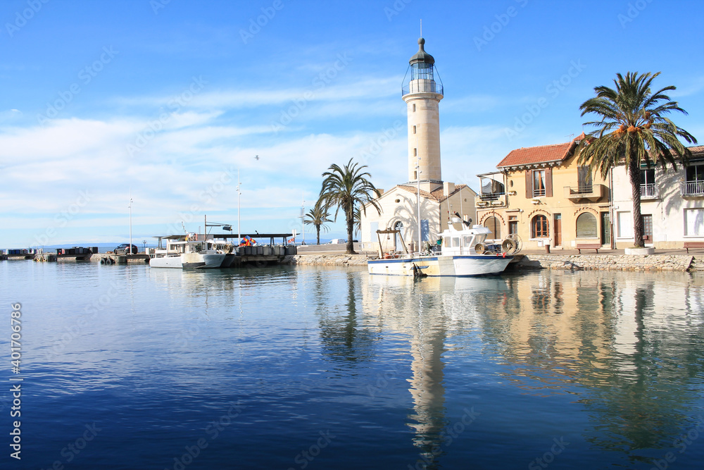 Lighthouse and old fishing port of Grau du roi in Camargue, a resort on the coast of Occitanie region in France
