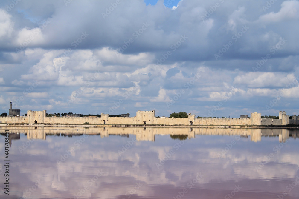 Reflection Of The Ramparts Of The Medieval City Of Aigues Mortes In The 