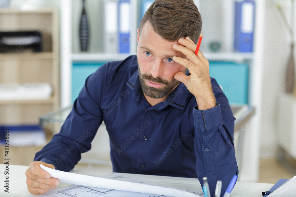 architect thinking about house construction architect thinking about house construction