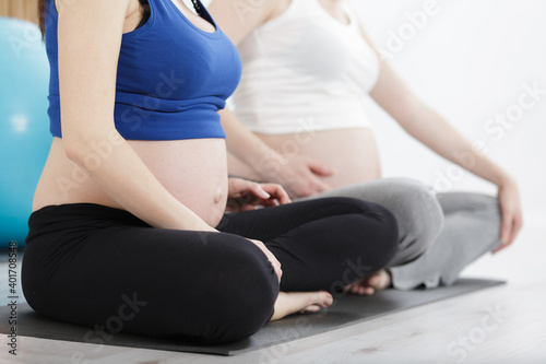 pregnant woman in yoga class