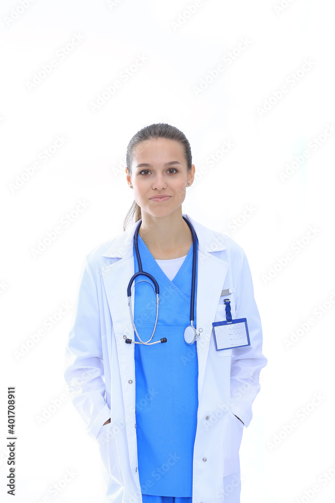Beautiful young woman in white coat posing with hand in pocket. Woman doctor Beautiful young woman in white coat posing with hand in pocket. Woman doctor