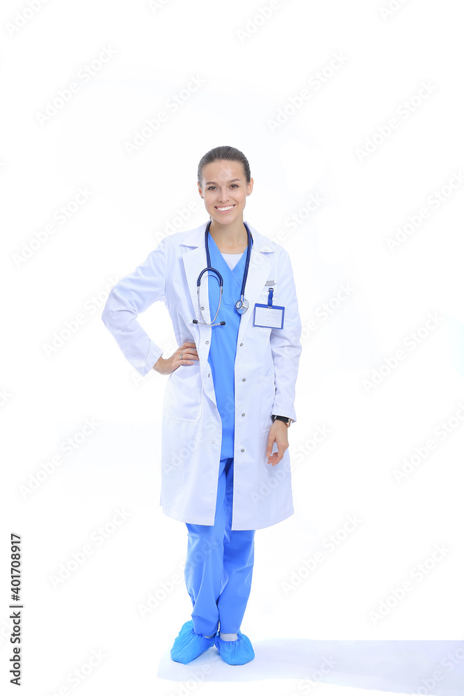 Beautiful young woman in white coat posing with hand in pocket. Woman doctor Beautiful young woman in white coat posing with hand in pocket. Woman doctor