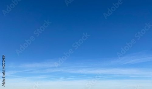 Blue sky with clouds on a clear sunny day