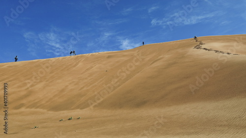 Tourists on the western megadune-Nuoertu Lake-Badain Jaran desert. Inner Mongolia-China-1183
