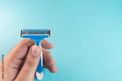 Blue and white modern razor - detail in macro