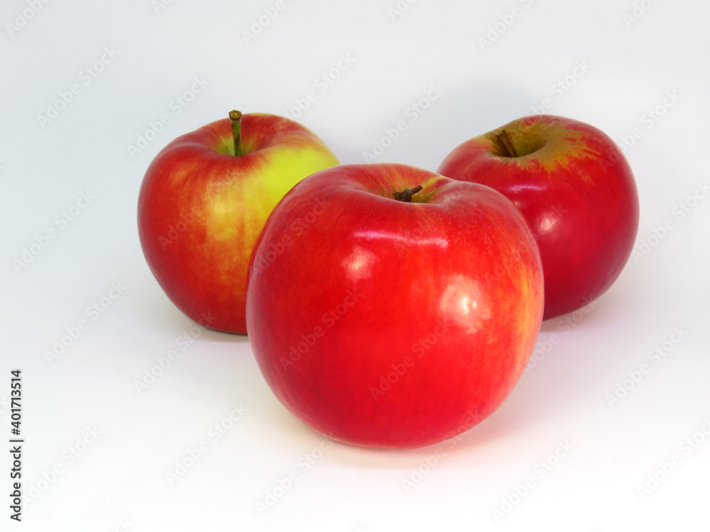 Three freshness red apples on white background. Three freshness red apples on white background.