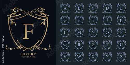 Letter F or collection initial alphabet with luxury ornament floral frame golden logo template.