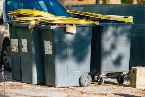 Garbage container in the street photo