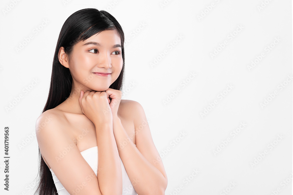 Beautiful Young asian Woman with Clean Fresh Skin, on Pink background, Face care, Facial treatment. Cosmetology, beauty and spa. Asian women portrait Beautiful Young asian Woman with Clean Fresh Skin, on Pink background, Face care, Facial treatment. Cosmetology, beauty and spa. Asian women portrait