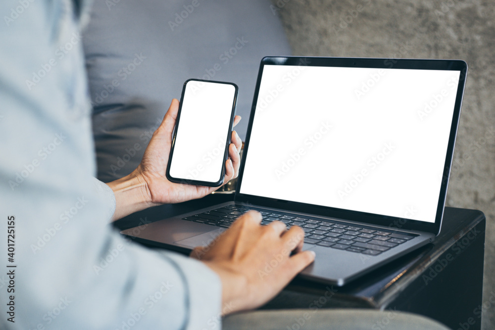 computer screen,cell phone blank mockup.hand woman work using laptop texting mobile.with white background for advertising,contact business search information on desk in cafe.marketing,design computer screen,cell phone blank mockup.hand woman work using laptop texting mobile.with white background for advertising,contact business search information on desk in cafe.marketing,design