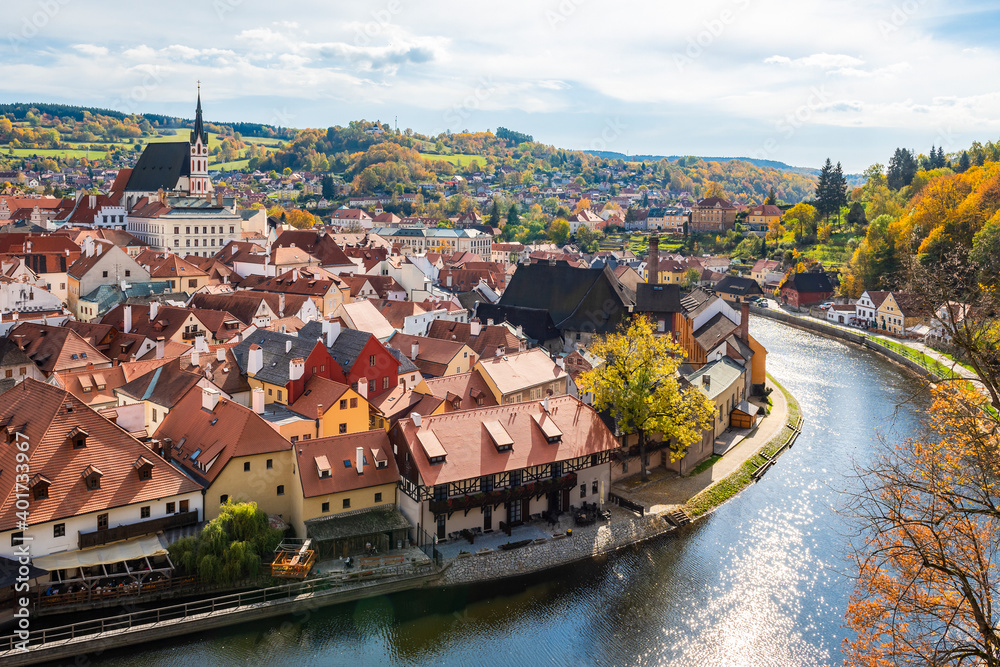 Aerial view of Vltava river, houses and medieval St. Vitus Church in Cesky Krumlov in the Czech Republic
