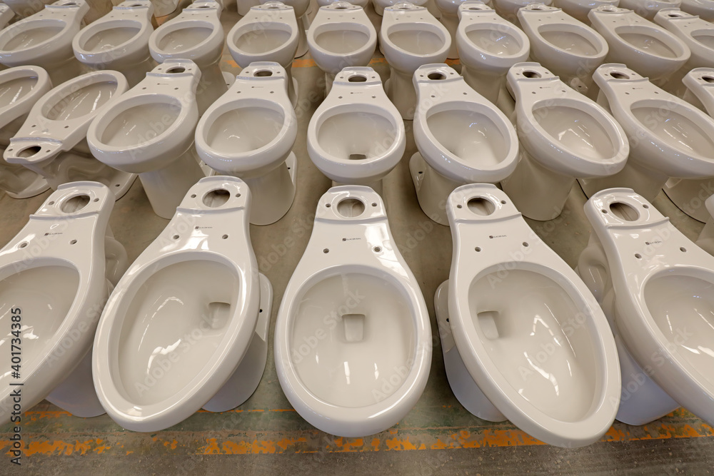Semi-finished ceramic toilets are in the factory Semi-finished ceramic toilets are in the factory