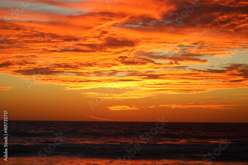 Glowing sky after the sun sets on the beach in Malibu California