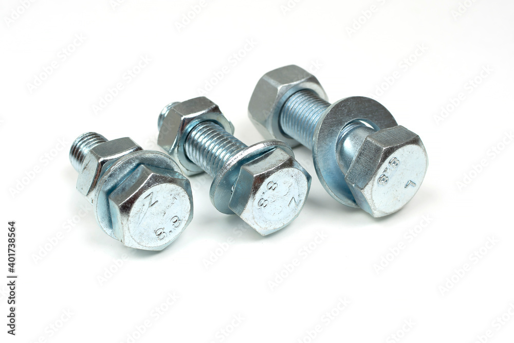 metal bolts and nuts on a white background metal bolts and nuts on a white background