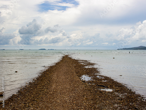 Landscape of the pathway in the sea with blue sky and cloud  Thailand.