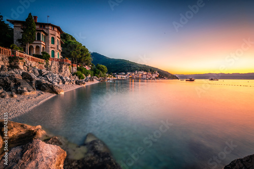 Moscenicka draga Istria in Croatia. Nice sea and beach photo with town and port. Nice clear sunrise in the morning. Overview of the beautiful coast of the historic city