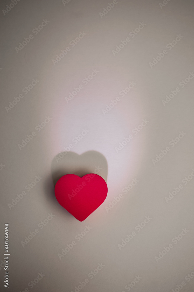 one red heart on a white background