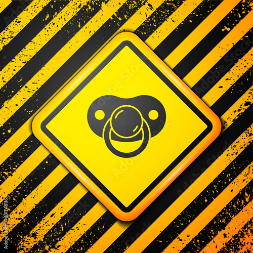 Black Baby dummy pacifier icon isolated on yellow background. Toy of a child. Warning sign. Vector.