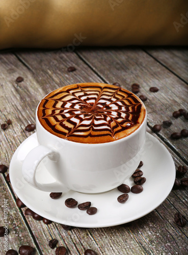 Fototapeta Naklejka Na Ścianę i Meble -  hot beverage coffee cappuccino wooden background with coffee beans 