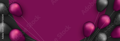 Pink black foil balloons with threads on black background.