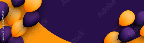 Orange and violet balloons with threads on dark violet and orange background.
