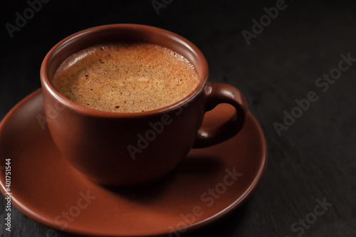 Coffee cup on stone background. Top view with copy space for your text