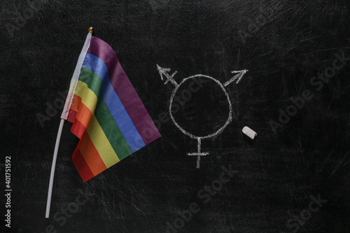 Rainbow flag and gender lgbt symbol drawn chalk on blackboard photo