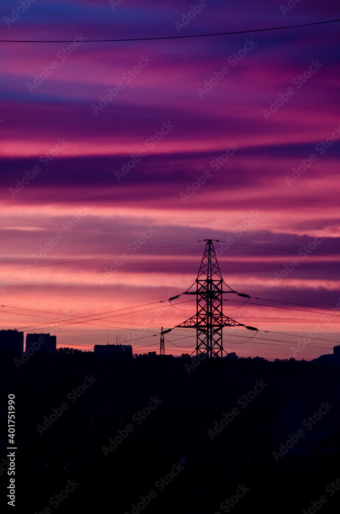 Silhouette of the pillar on the background of the city