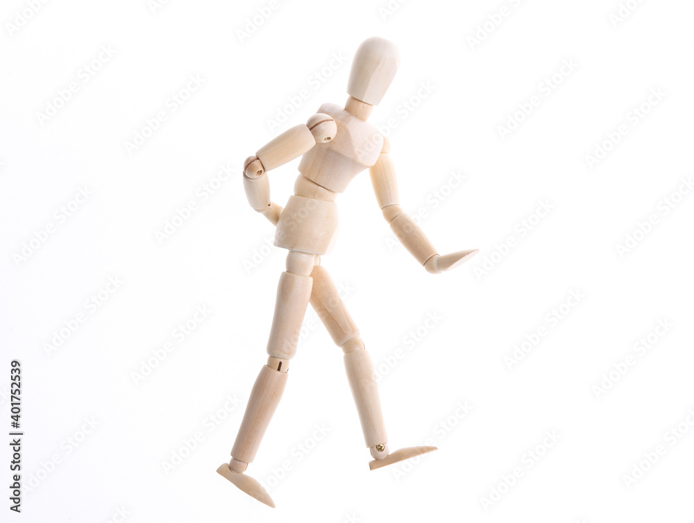 Wooden puppet with back pain isolated on white background. Wooden puppet with back pain isolated on white background.