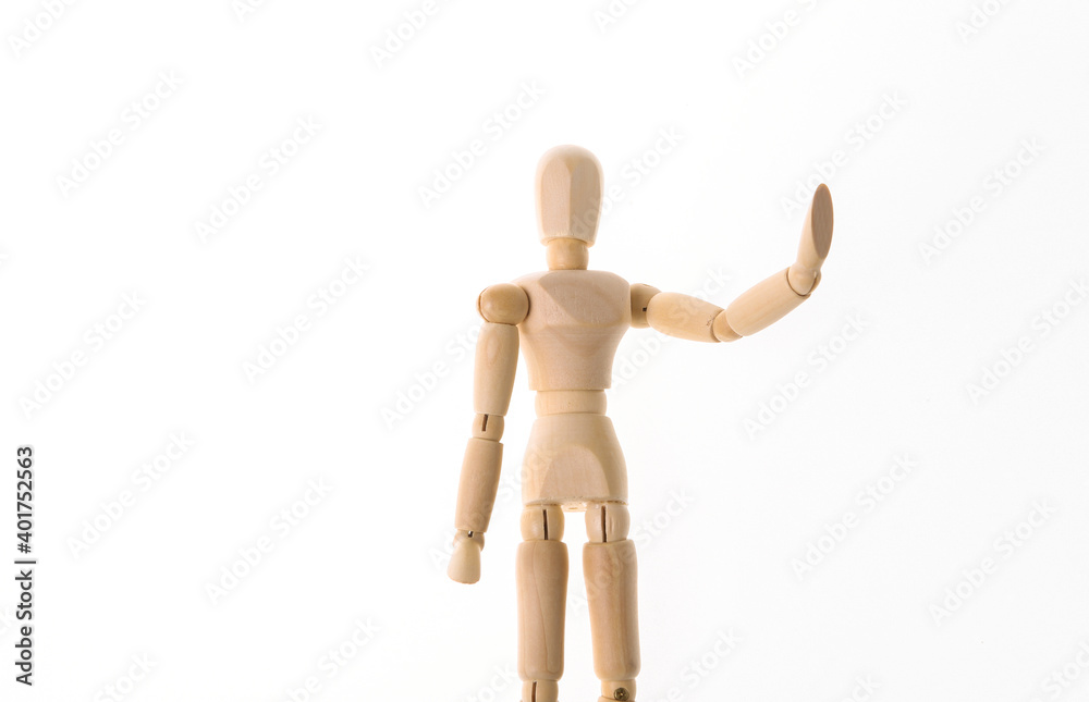 Wooden puppet shows hand stop isolated on white background Wooden puppet shows hand stop isolated on white background