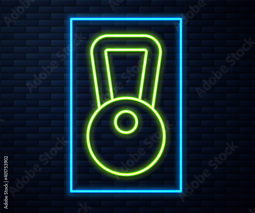 Glowing neon line Kettlebell icon isolated on brick wall background. Sport equipment. Vector.