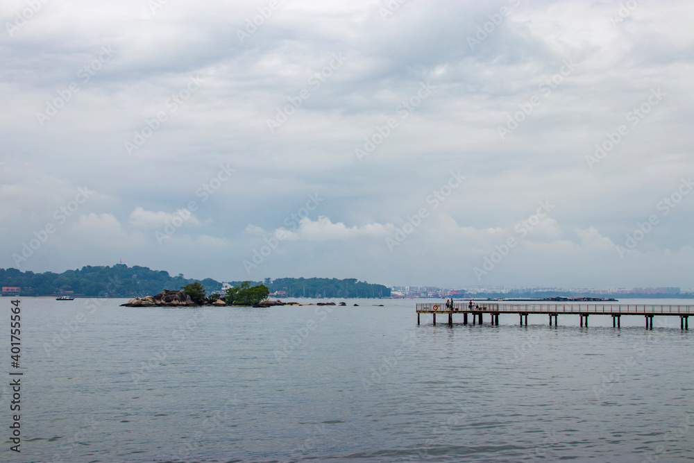 the  boardwalk and Frog Island (Pulau Sekudu) in Chek Jawa wetland.
It is a cape and the name of its 100-hectare wetlands located on the south-eastern tip of Pulau Ubin island Singapore. 