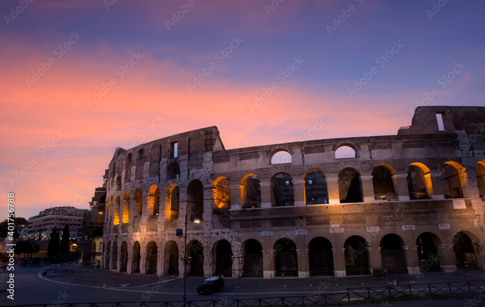 The Colosseum with sunset scene and  the night at Rome, Italy. which  the architecture and landmark. Rome Colosseum is one of the main attractions of Rome in Italy