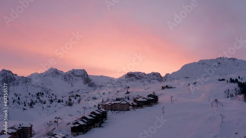 Drone shot of a closed ski resort because of Corona Virus beautiful sunrise light on fresh snow