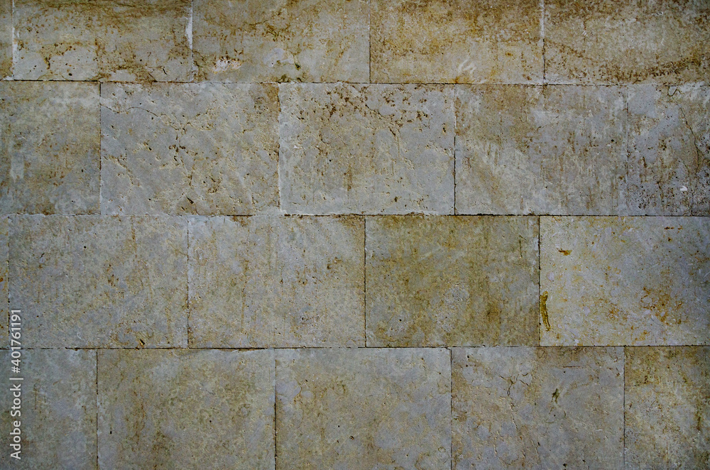 Fototapeta premium Texture of yellow stone bricks.