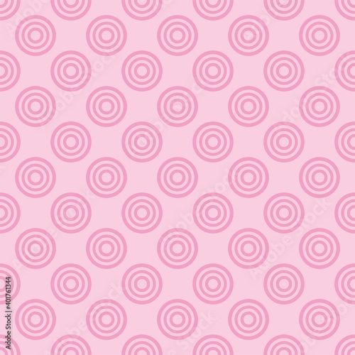 Seamless vector pattern with pink dots on a sweet pastel baby pink background