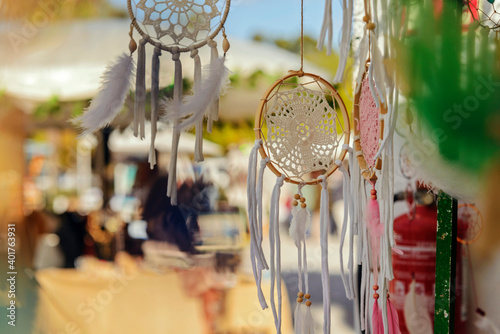 Handmade dreamcather with feathers and lace.