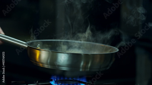 Adding Pepper. Close-Up Food. Cooking Process. Chef Cooking Dish. Chef Preparing Food photo still.