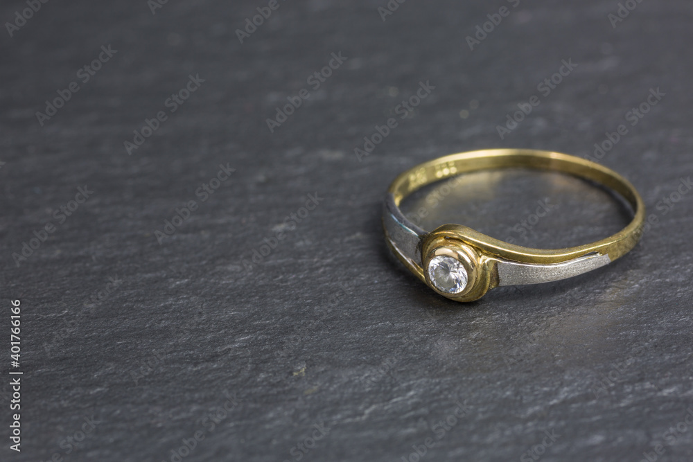 silver and golden ring with zirconia stone silver and golden ring with zirconia stone