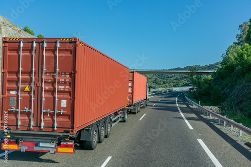 Euro-modular truck, road train or mega-truck with two 40-foot containers traveling on the highway.