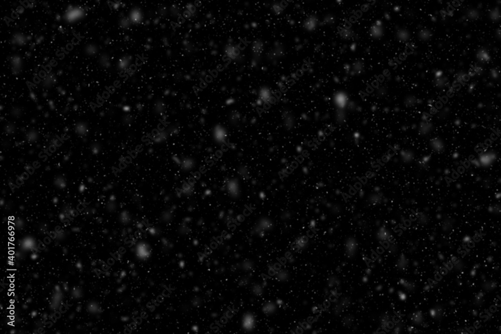 Obraz premium Falling snowflakes on black background
