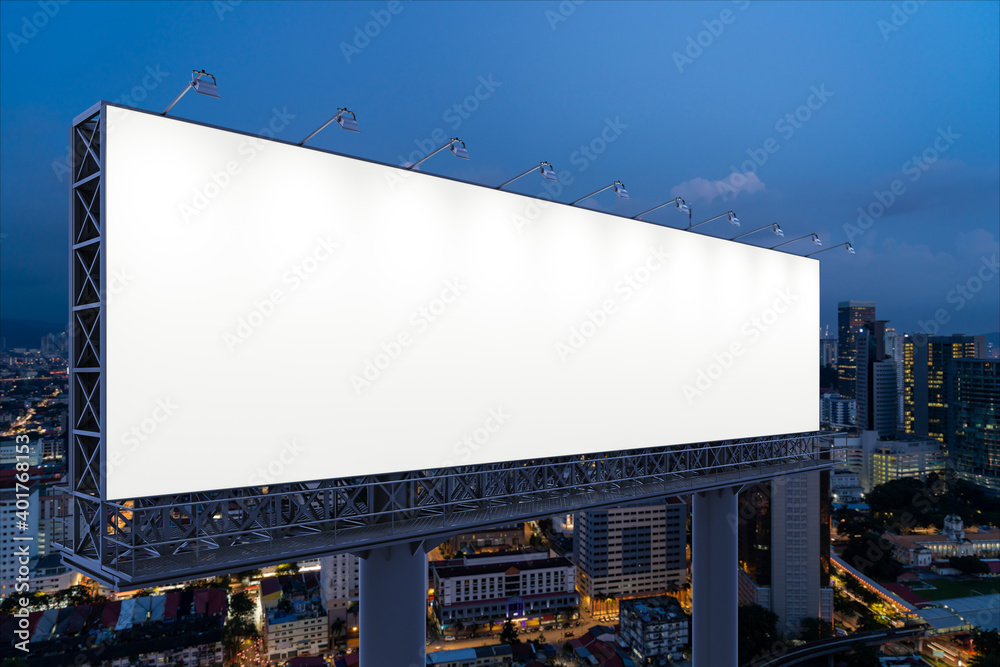 Blank white road billboard with KL cityscape background at night time. Street advertising poster, mock up, 3D rendering. Side view. The concept of marketing communication to promote or sell idea. Blank white road billboard with KL cityscape background at night time. Street advertising poster, mock up, 3D rendering. Side view. The concept of marketing communication to promote or sell idea.