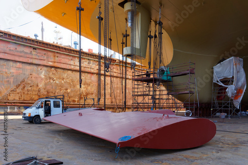 detail of ship's wheel inside a dry dock