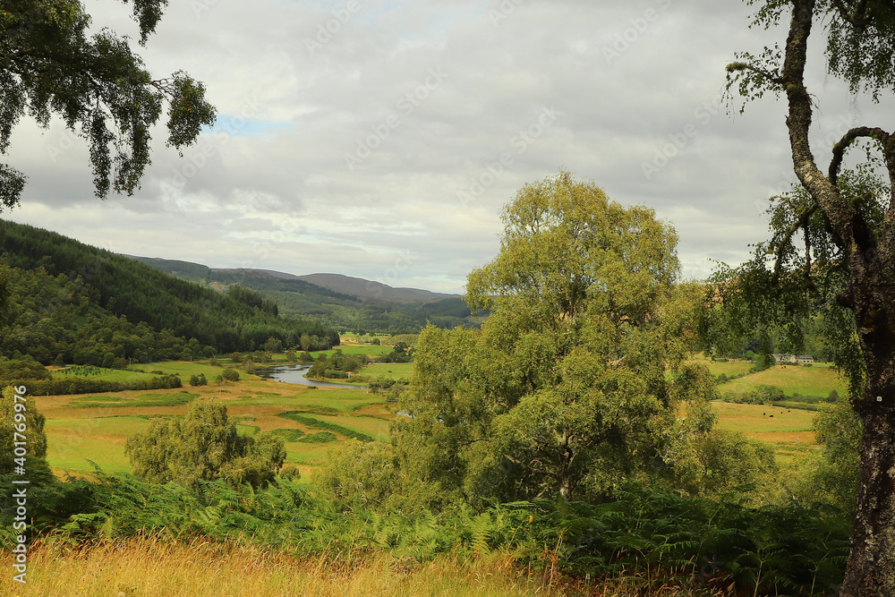 A view down from the hills of Scotland to the glens, rivers and lochs below