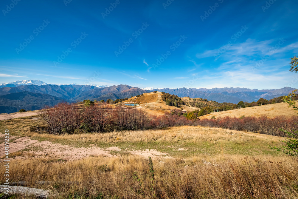View of the mountains range of Italy and Switzerland, seen from the peak of Mottarone mountain (Piedmont, Northern Italy), early fall season.