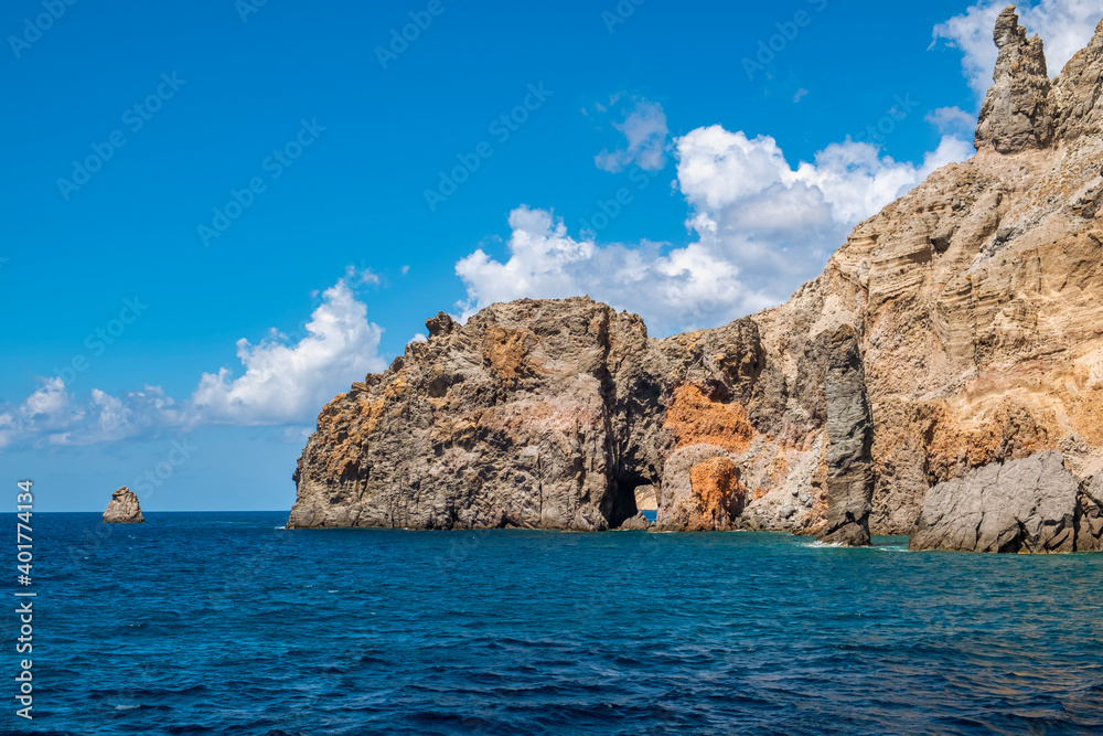 View of the coastline of the Aeolian Island, group of small volcanic islands, located in the Mediterranean Sea, between the shores of Sicily and Calabria Regions (Southern Italy).