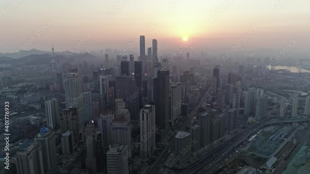 Panorama of foggy city in the morning, aerial view of cityscape at sunrise Panorama of foggy city in the morning, aerial view of cityscape at sunrise