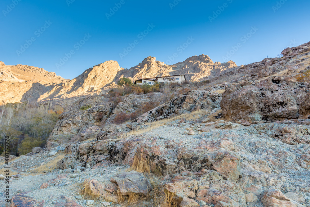 Barren mountain in Darband valley in autumn in the morning against blue sky in the Tochal mountain. A popular recreational region for Tehran's residents Barren mountain in Darband valley in autumn in the morning against blue sky in the Tochal mountain. A popular recreational region for Tehran's residents
