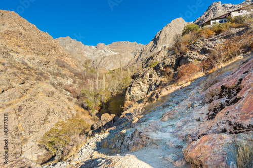 Barren mountain in Darband valley in autumn in the morning against blue sky in the Tochal mountain. A popular recreational region for Tehran's residents