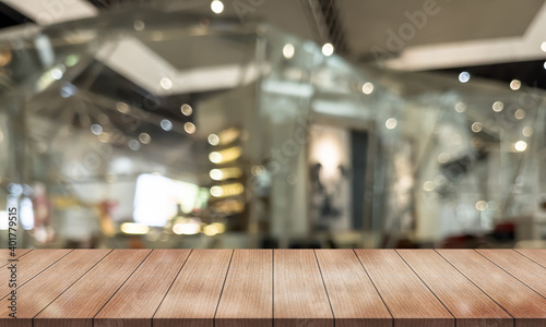 Empty wood table on blur restaurant background. Wooden top table background.